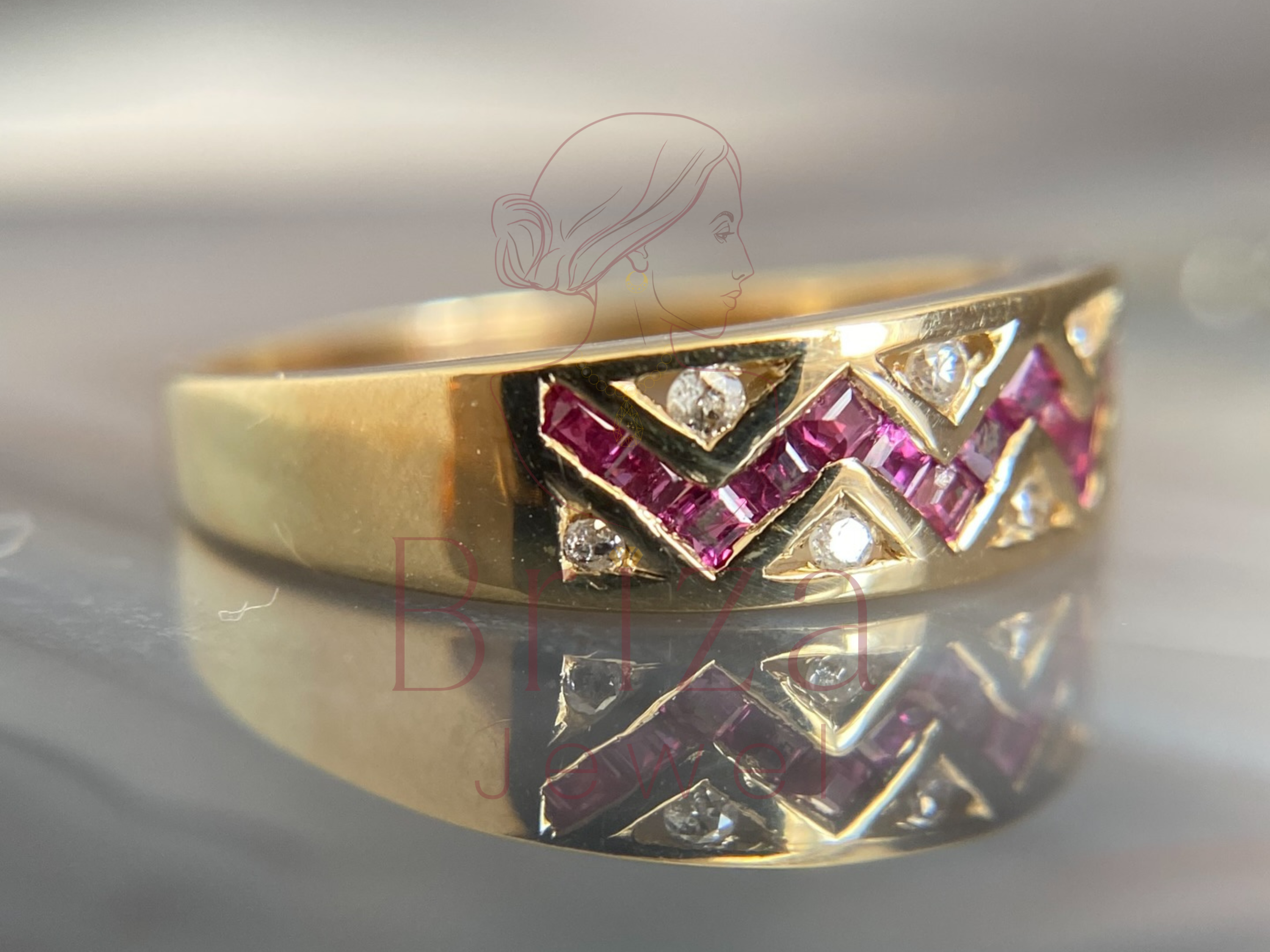 wedding band chevron close-up showing pink sapphire diamond detail