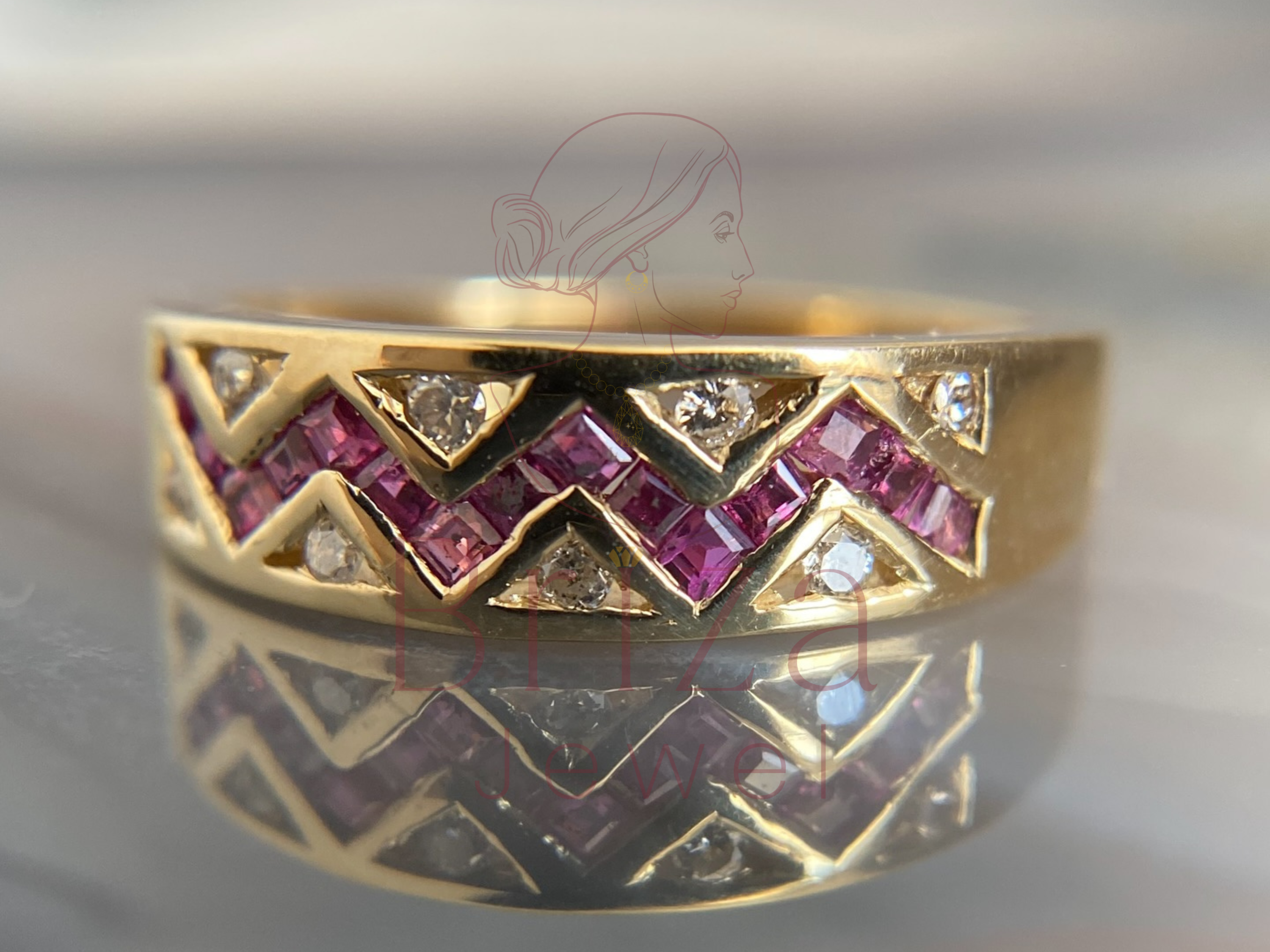 vintage gold ring with pink sapphire and diamond accents