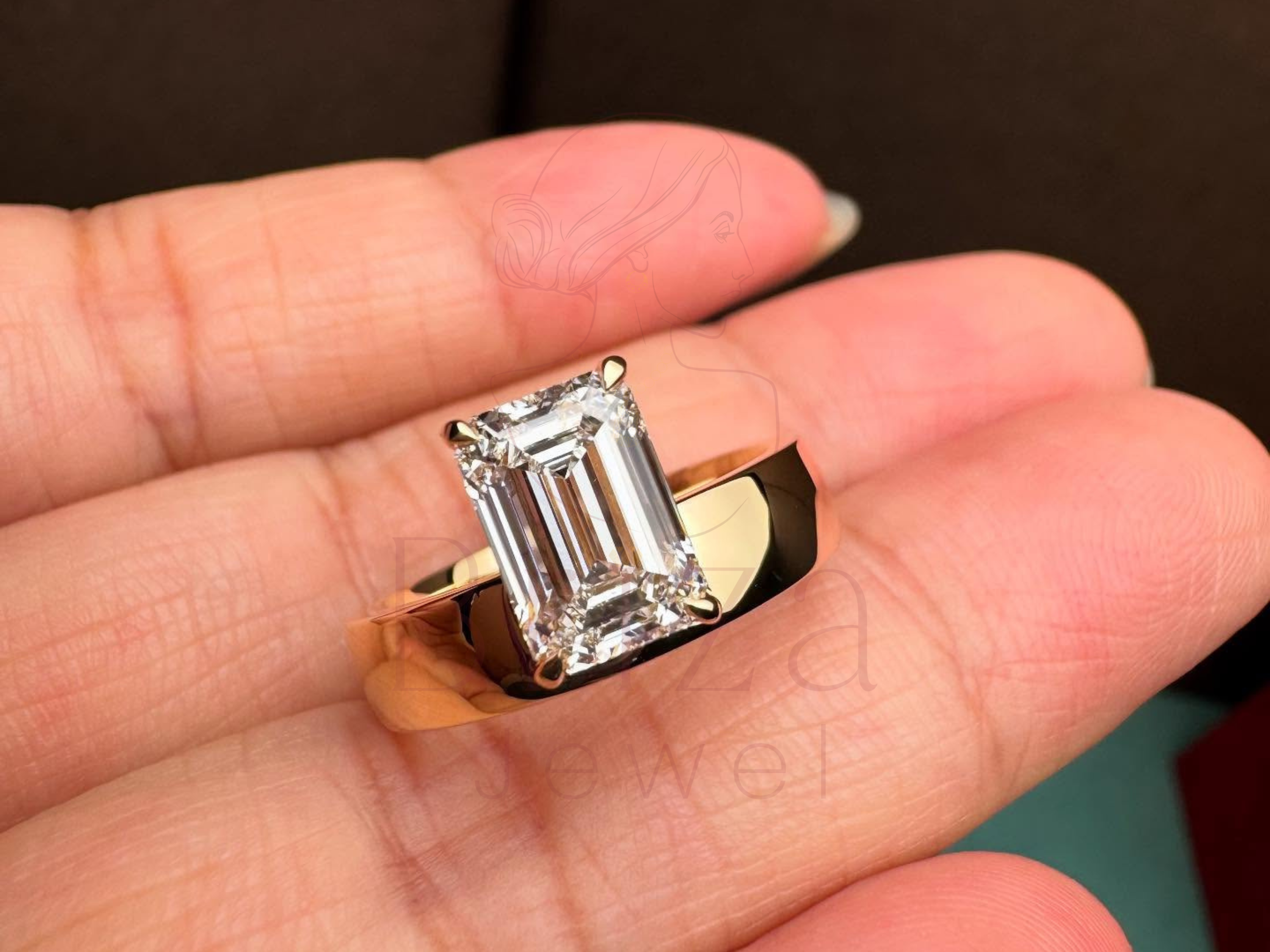 side view of geometric gold setting with raised center stone