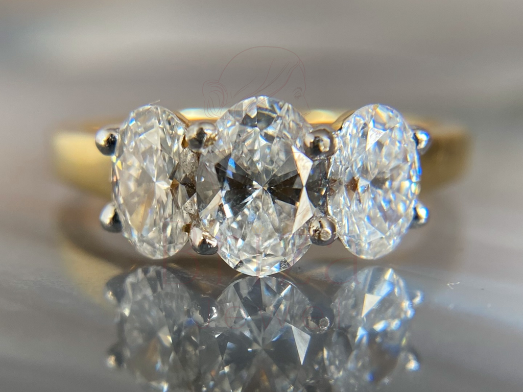 Three Stone Oval Engagement Ring with Classic Gold Style