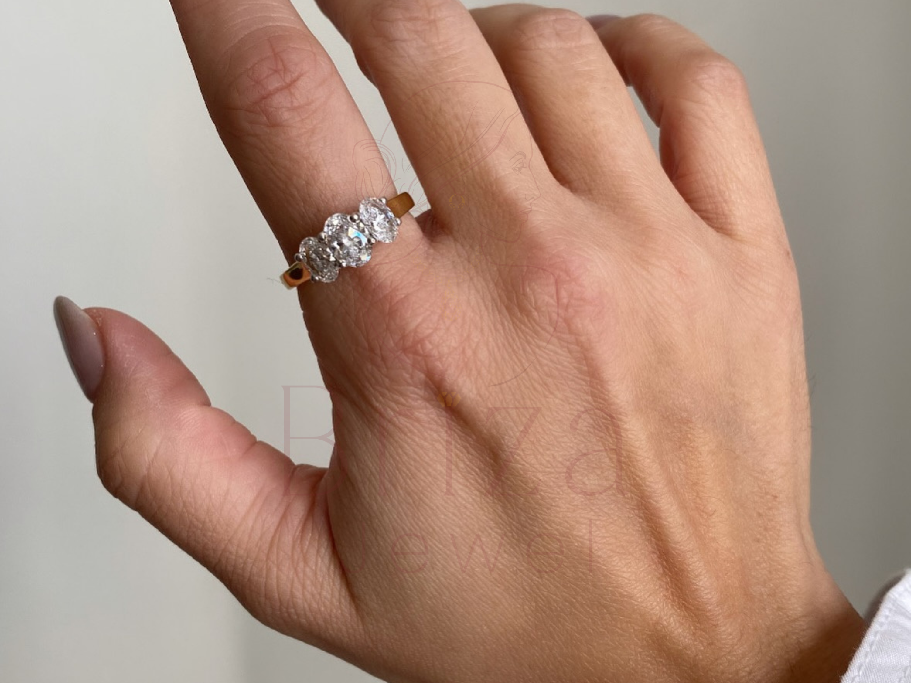 Three Stone Oval Engagement Ring with Classic Gold Style