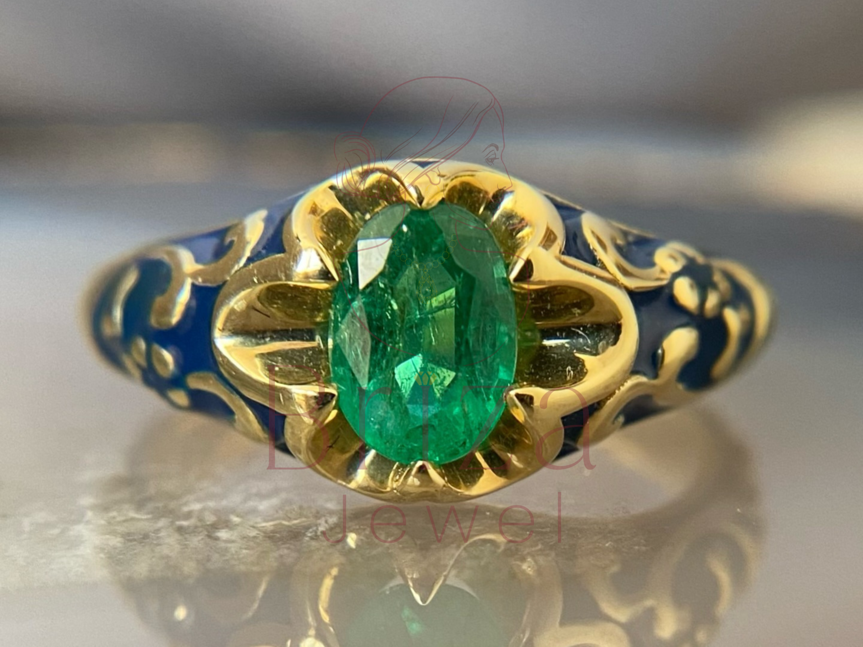 vintage emerald ring with classic gold enamel birthstone design