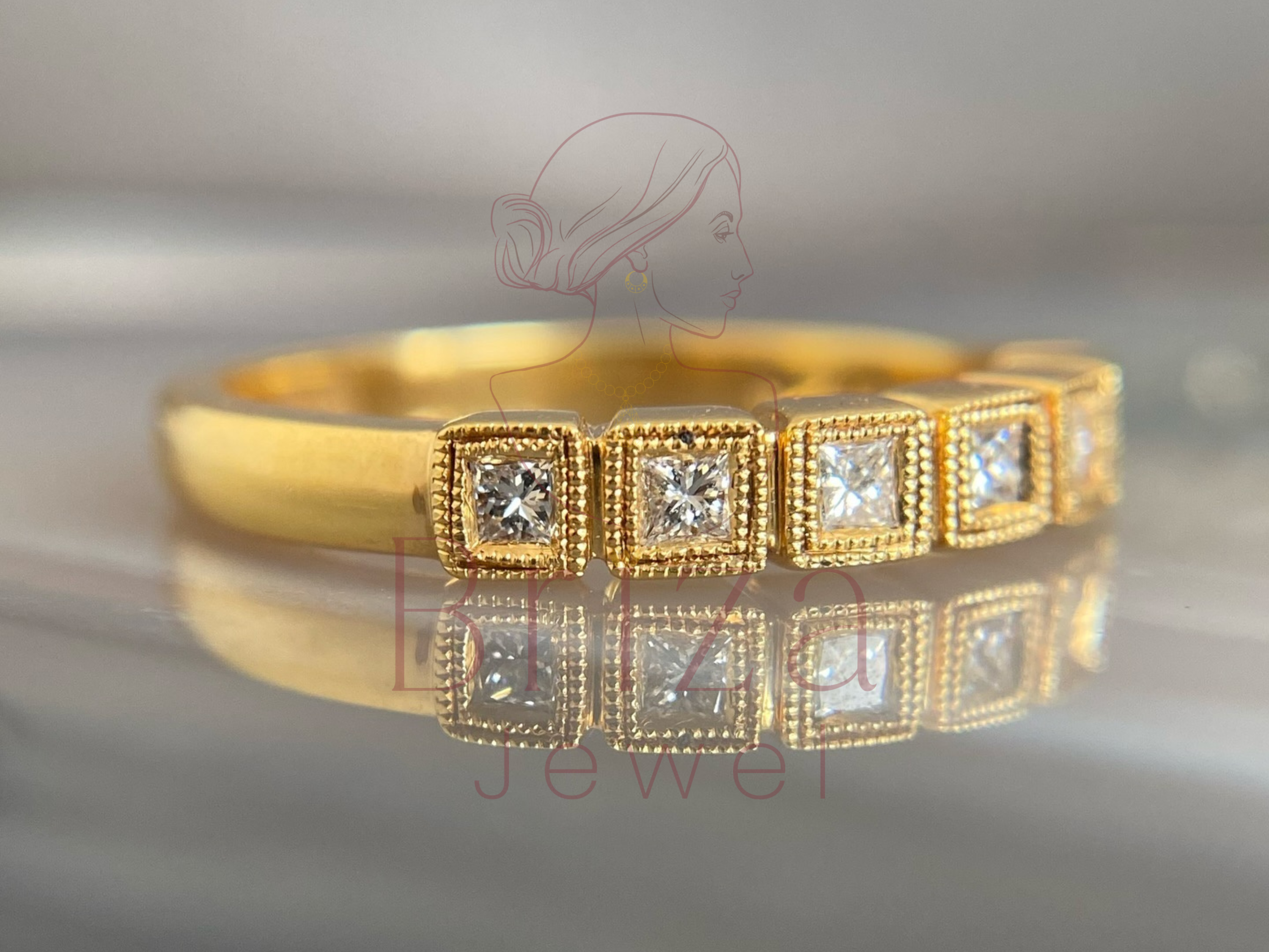 square-cut moissanite stones set along a slim gold band