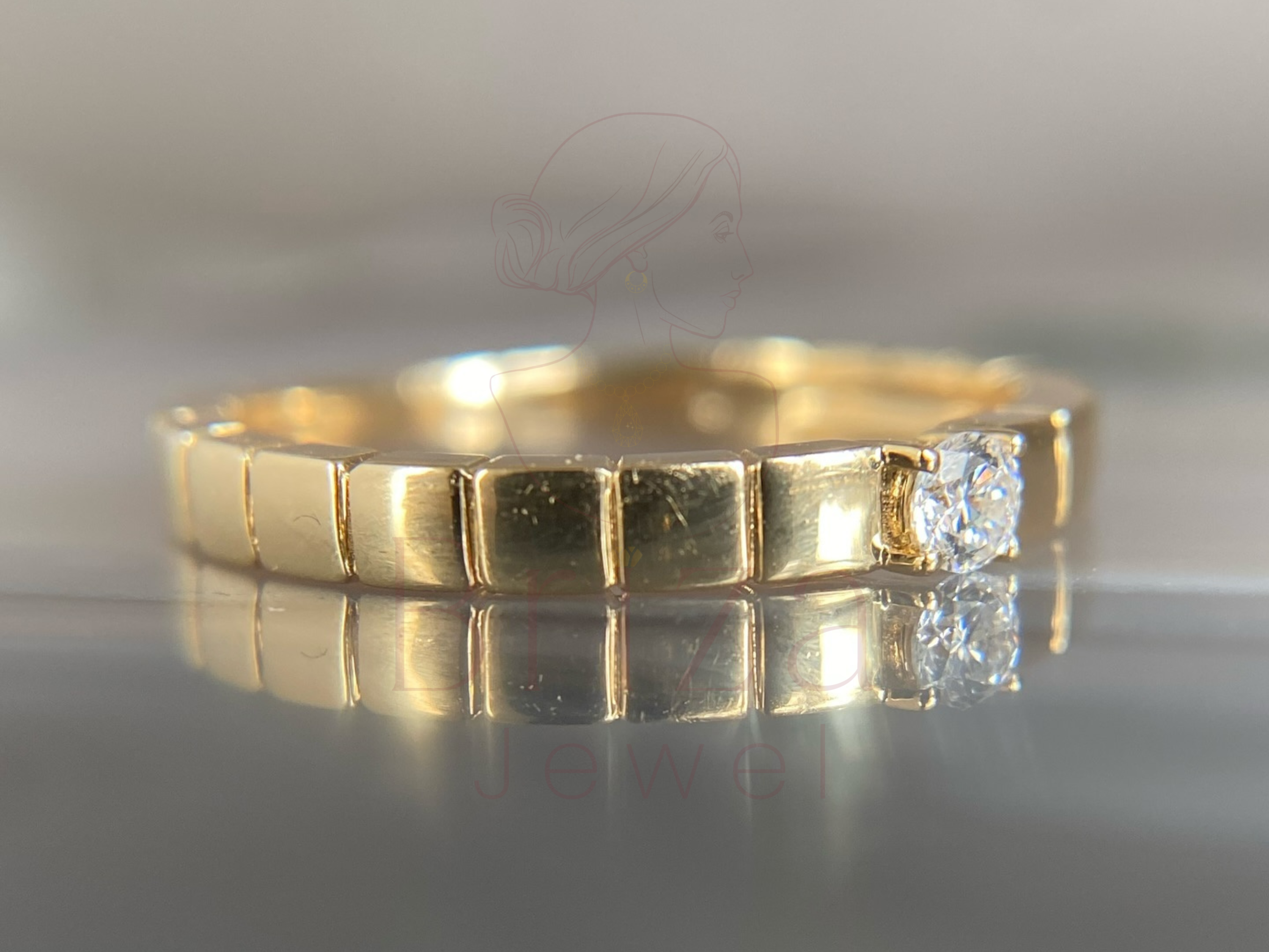 gold solitaire jewelry design with clean minimal setting