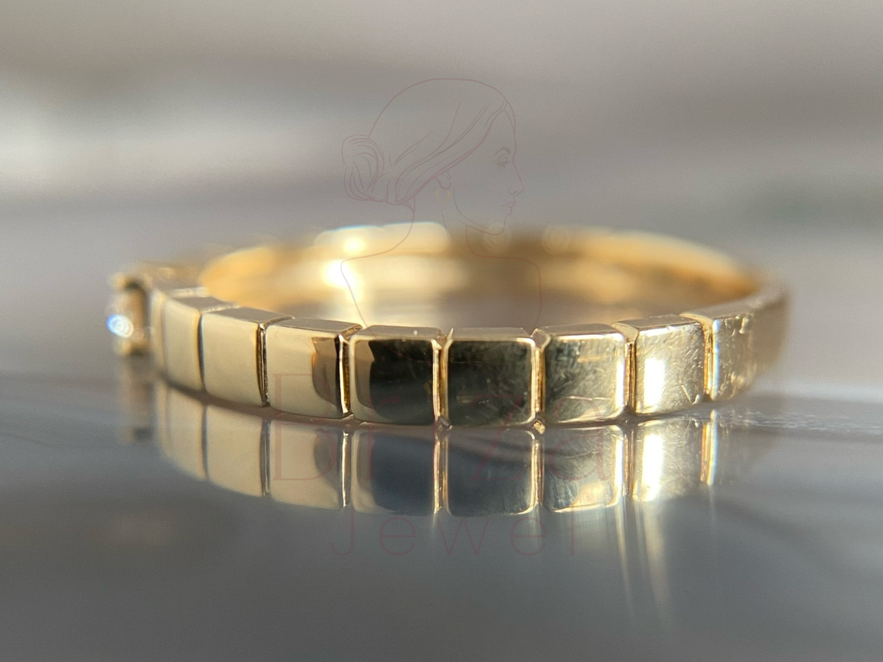 minimal gold jewelry worn on hand lifestyle view