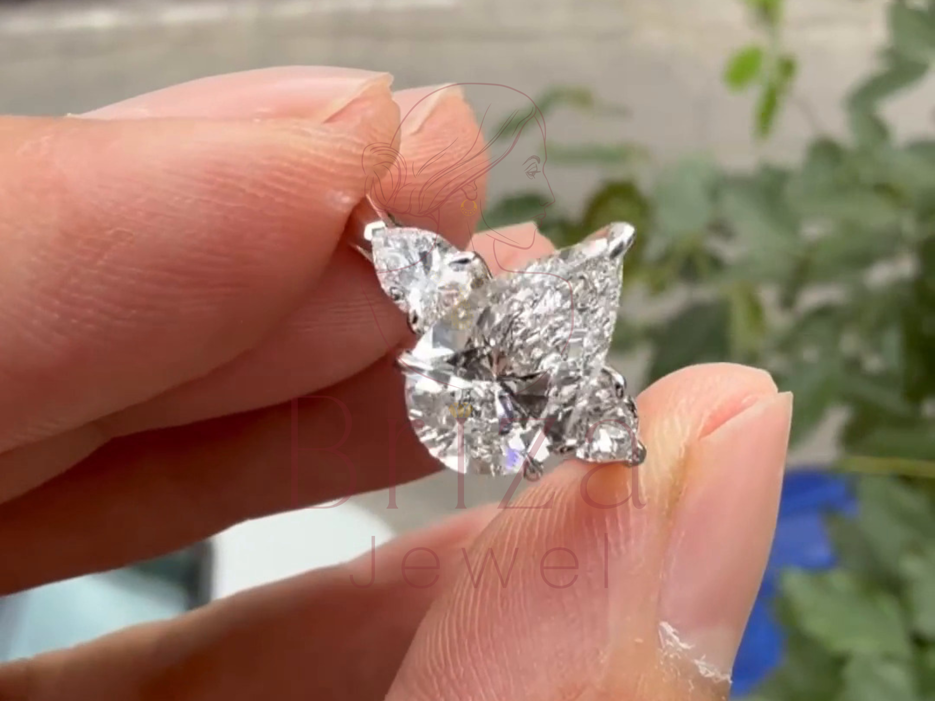 three stone jewelry design worn on hand lifestyle view