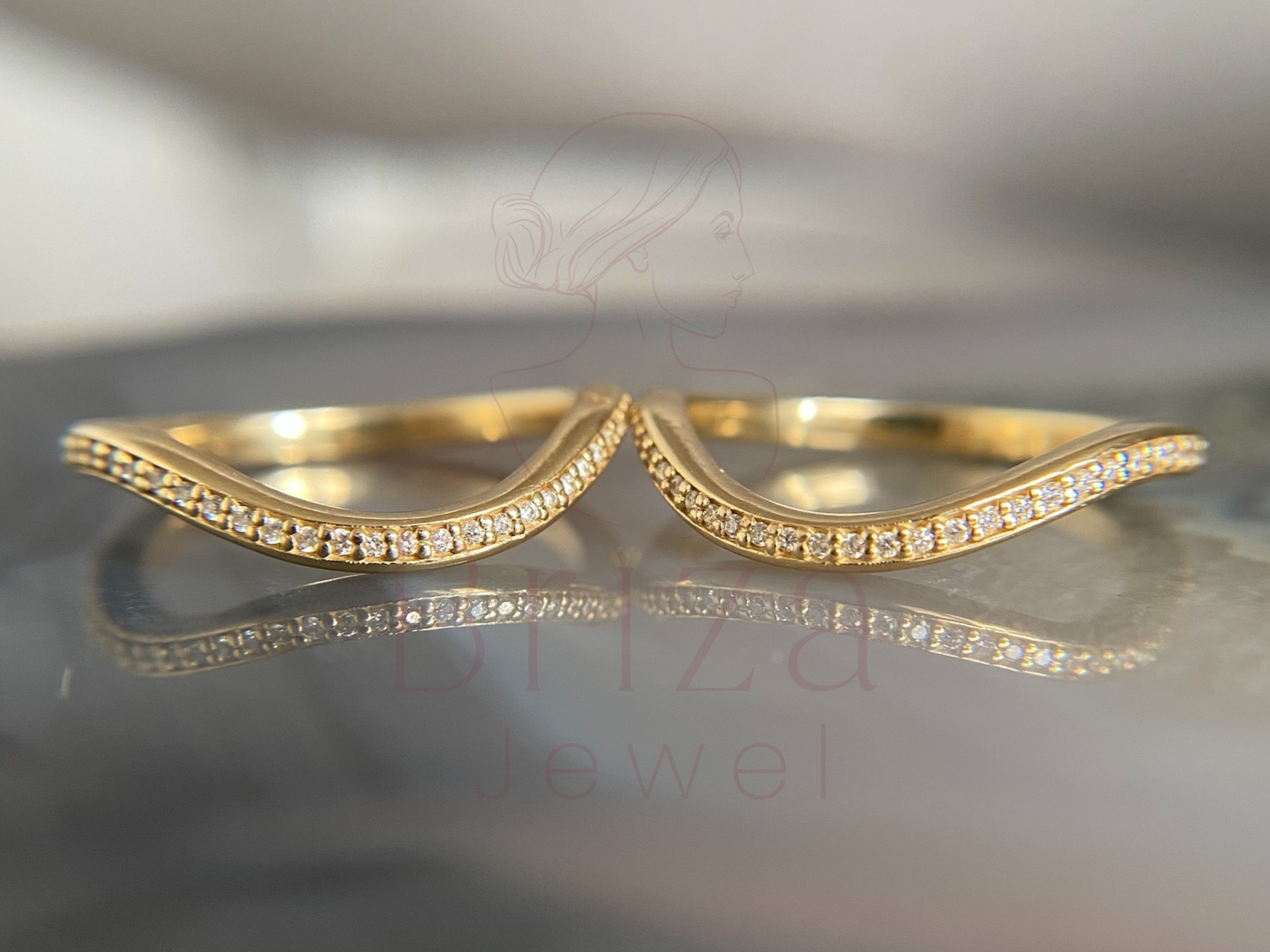 side view of slim diamond band with gentle curve