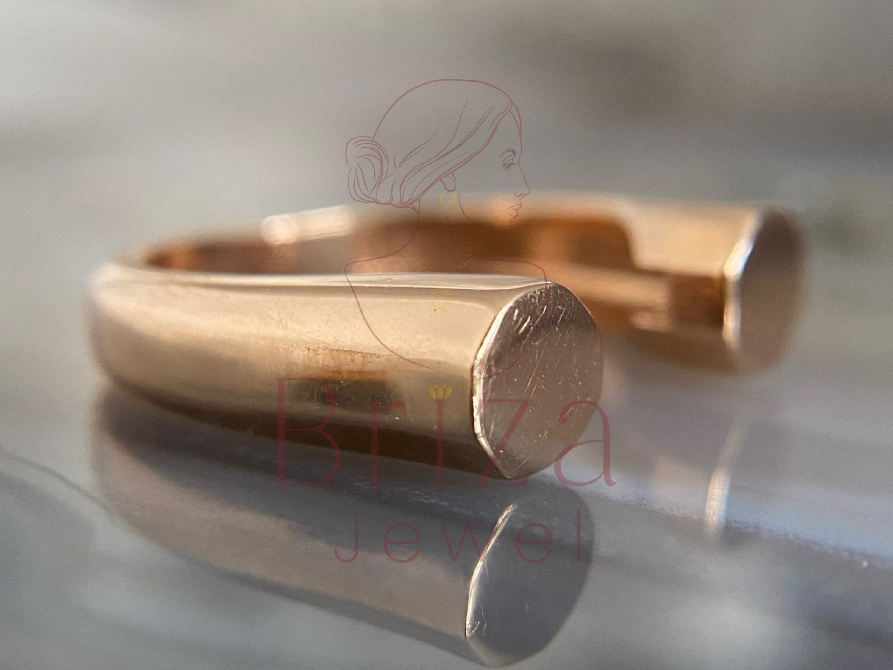 minimal gold jewelry worn on hand lifestyle view