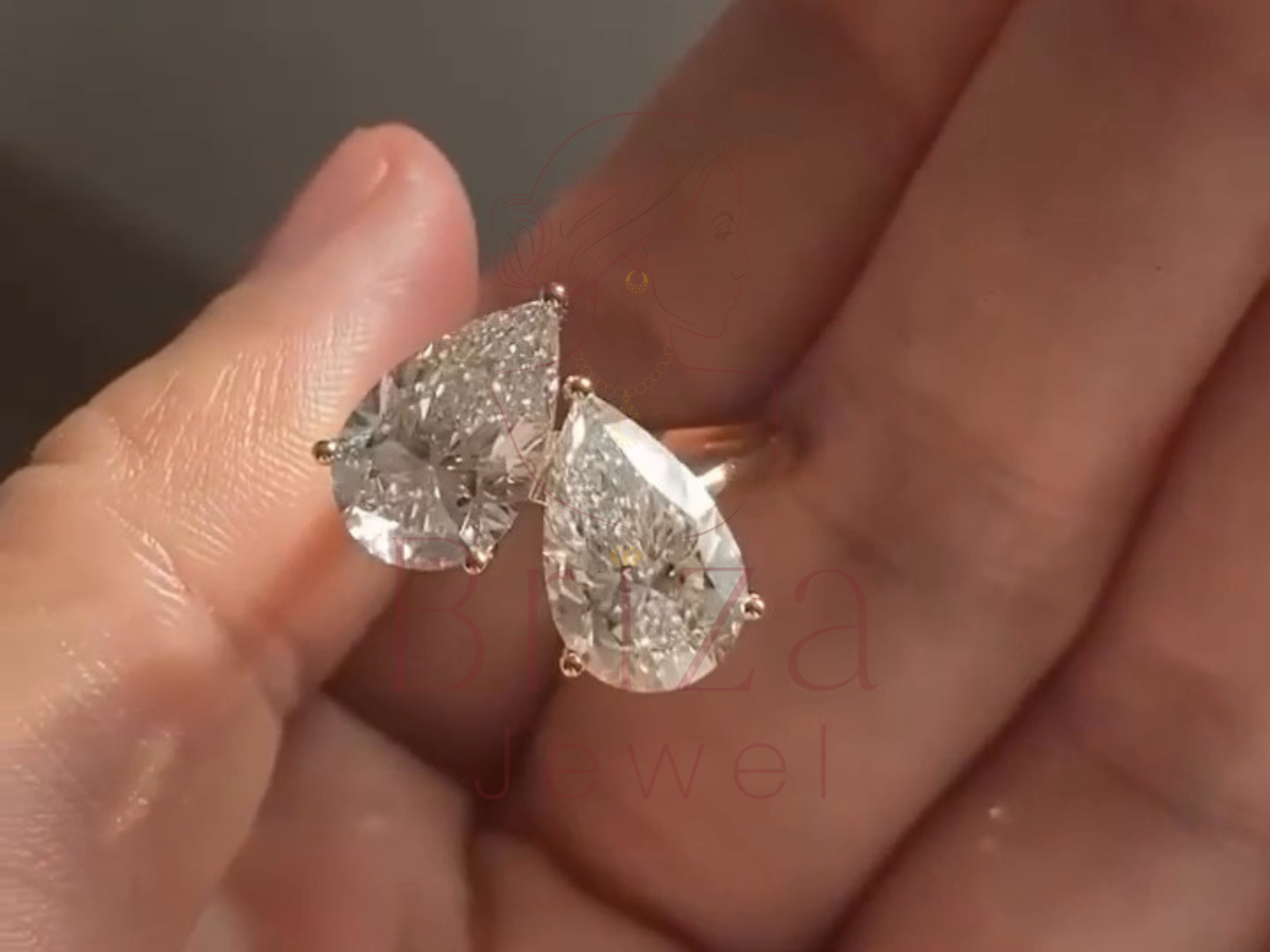 romantic two-stone jewelry worn on hand lifestyle view