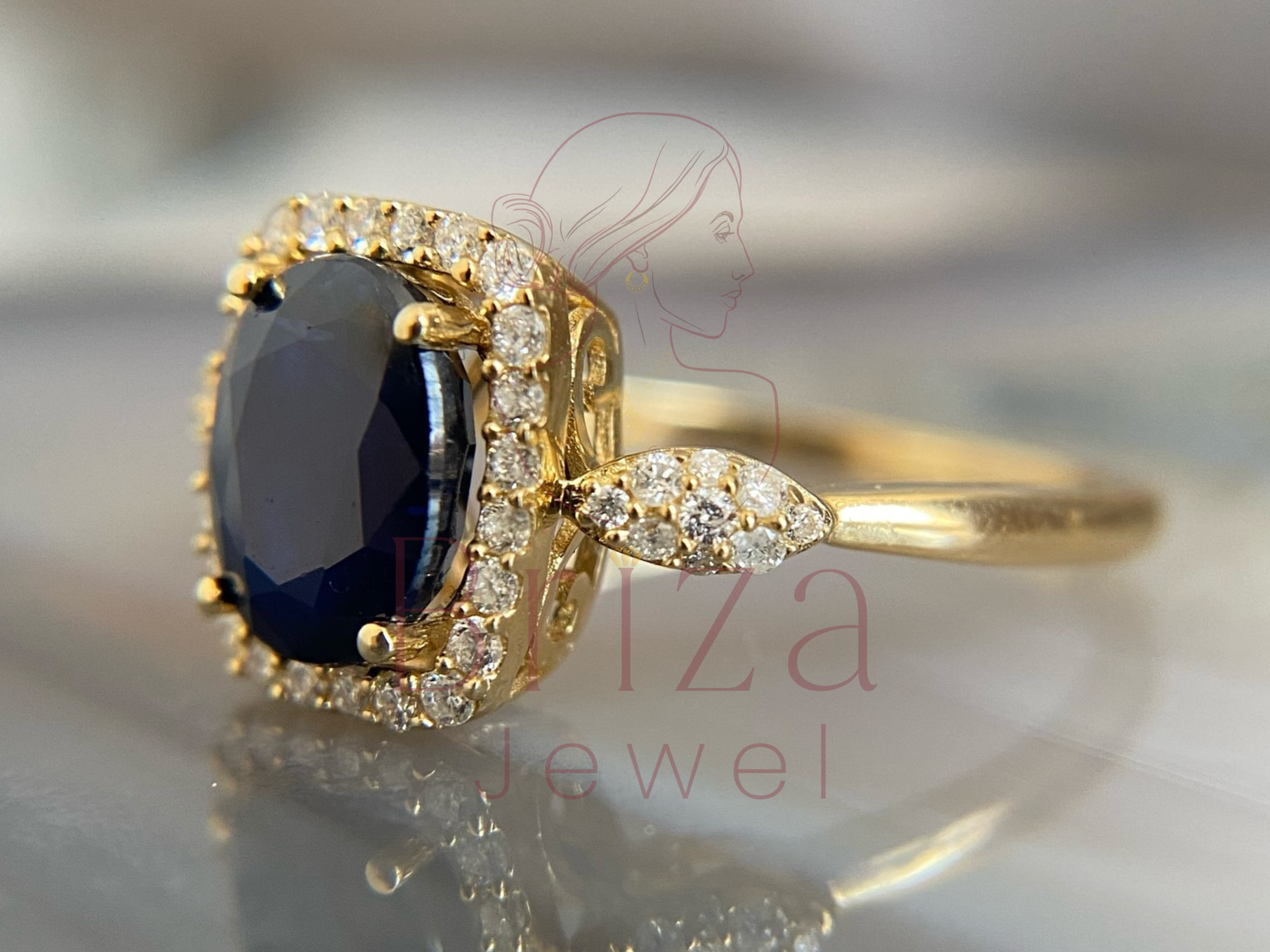 side view of gold ring with halo diamond setting