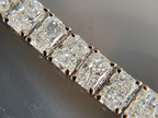 Close-up of a diamond bracelet with a blurred background