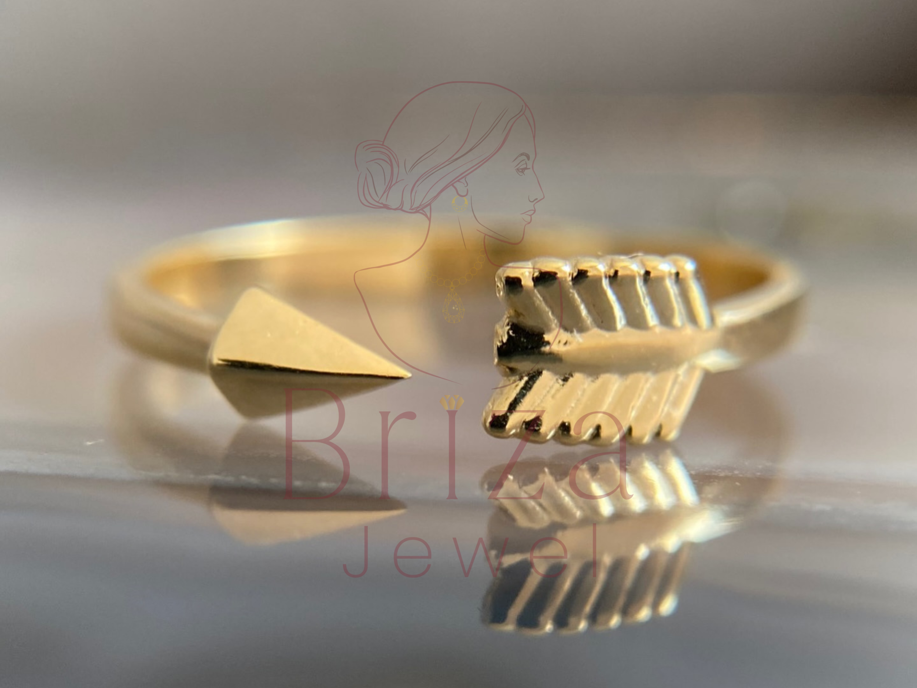 simplistic engagement ring with gold arrow dainty wrap design