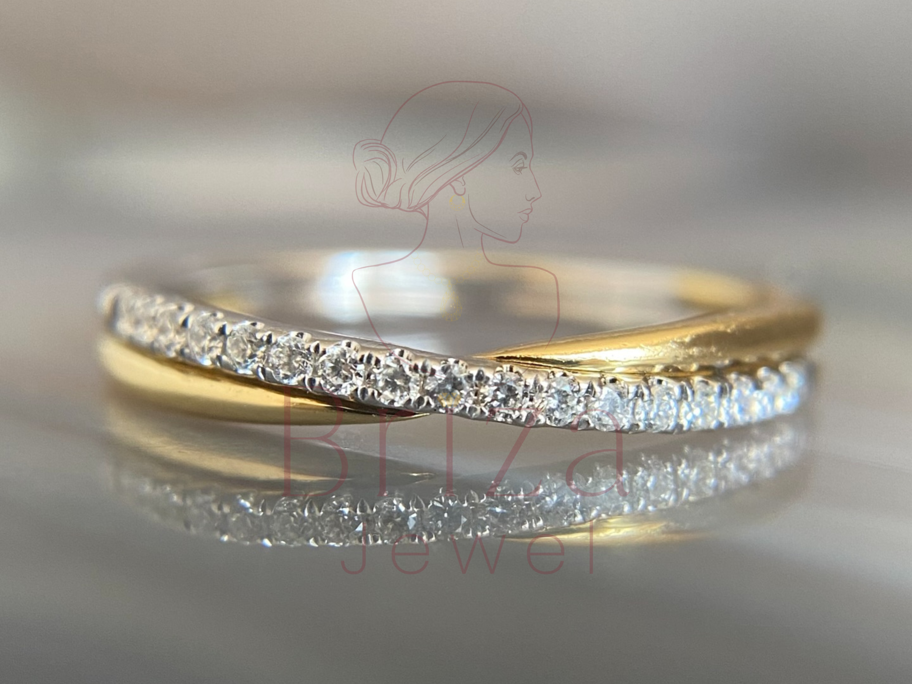 two tone engagement ring with diamond pavé band design