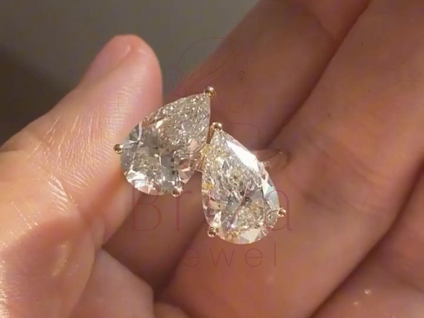 toi et moi ring with double pear moissanite stones