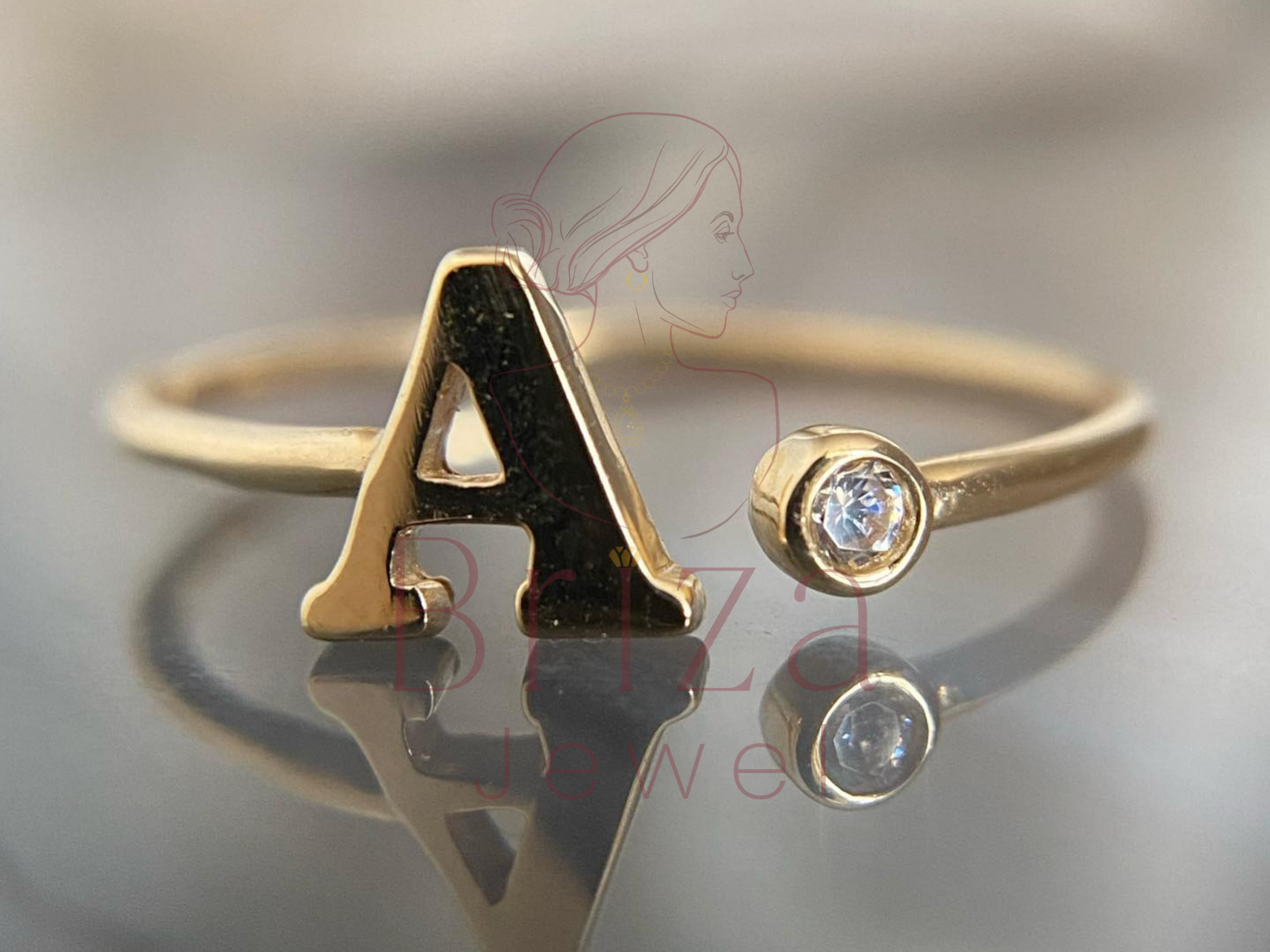 A Gold Ring with Personalized Letter Diamond Design for Women