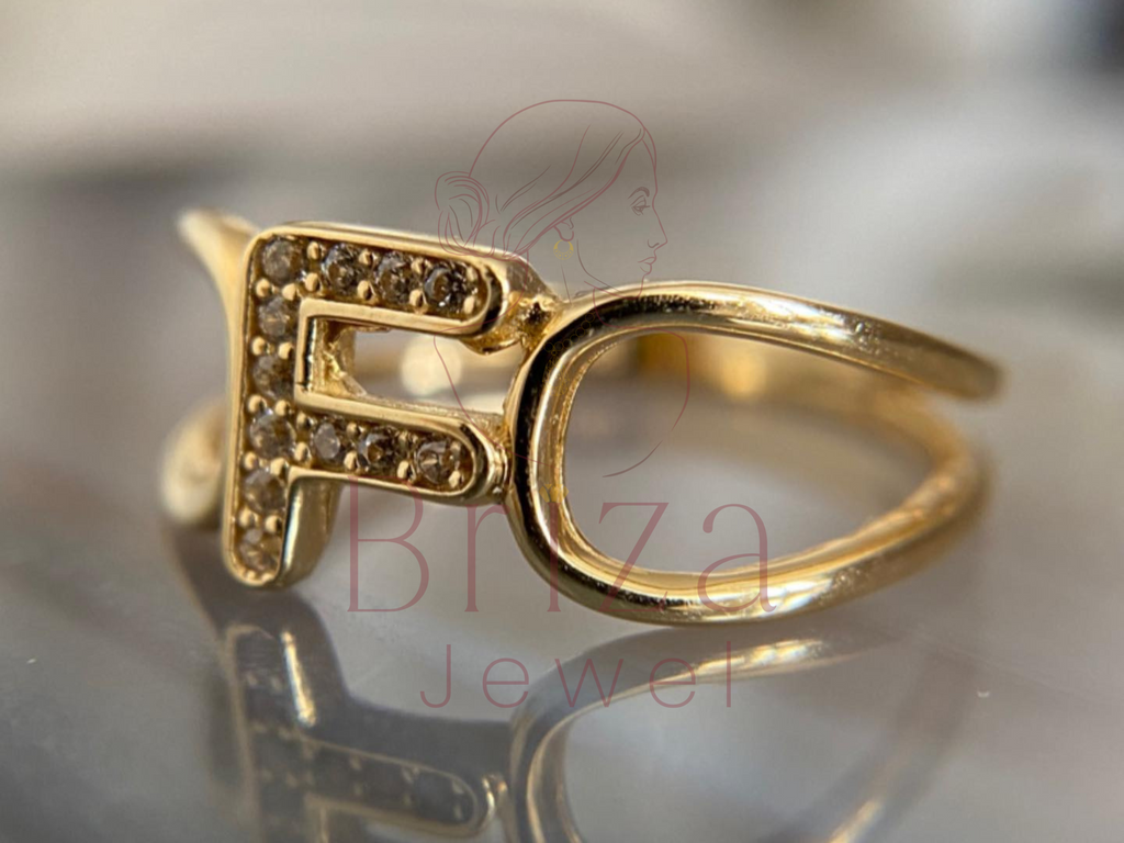 side view of open gold band with diamond setting