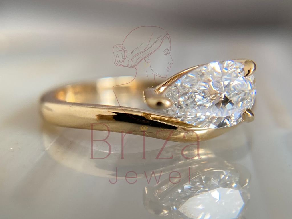 Pear Engagement Ring with Minimalist Teardrop Diamond