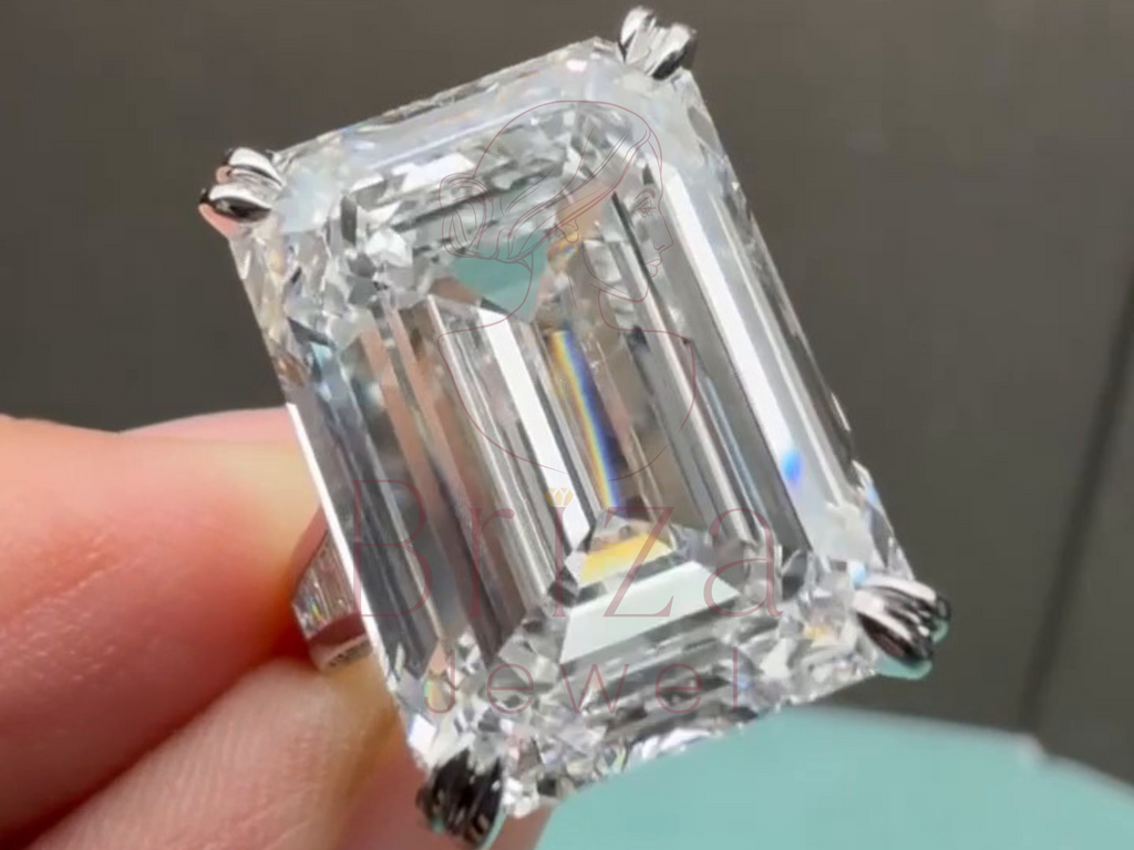 modern moissanite engagement ring worn on hand lifestyle view