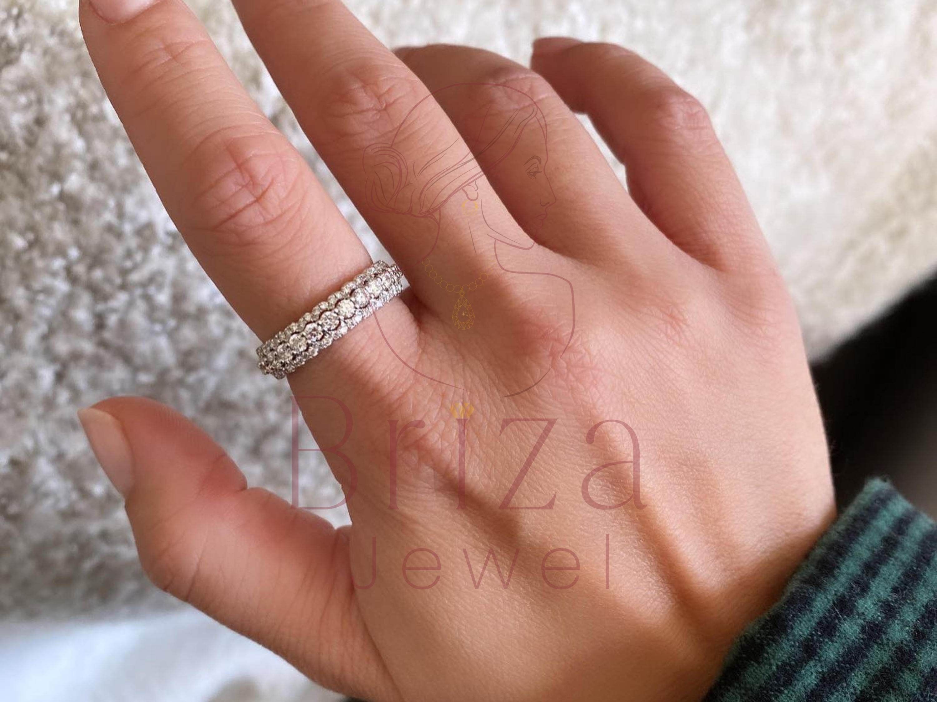 triple row diamond ring close-up showing three rows of stones