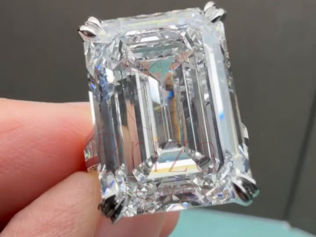 emerald cut moissanite ring with baguette accent stones