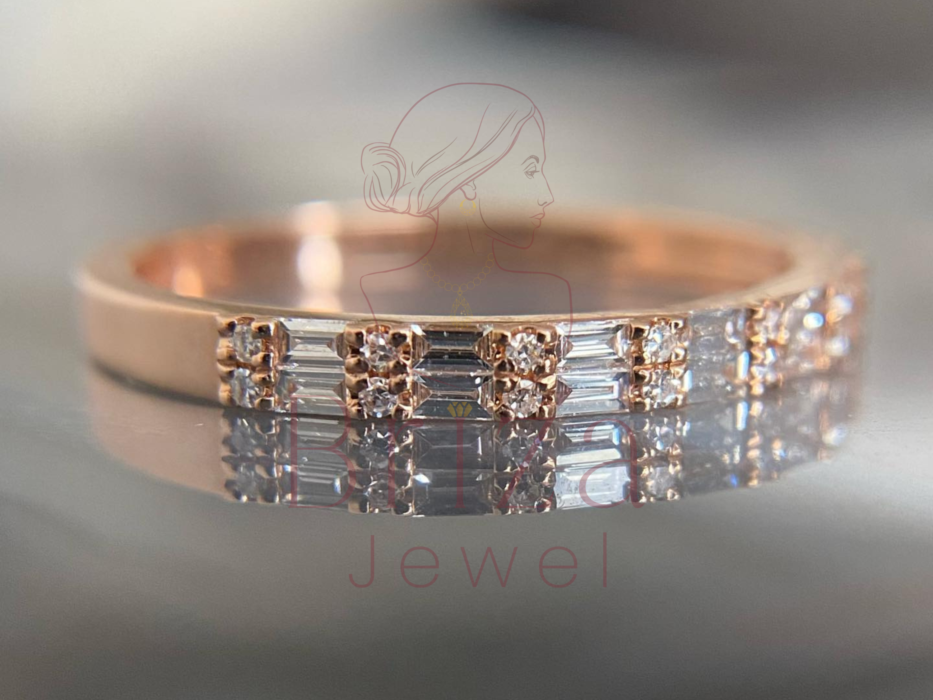 rose gold half eternity band with rectangular stone layout