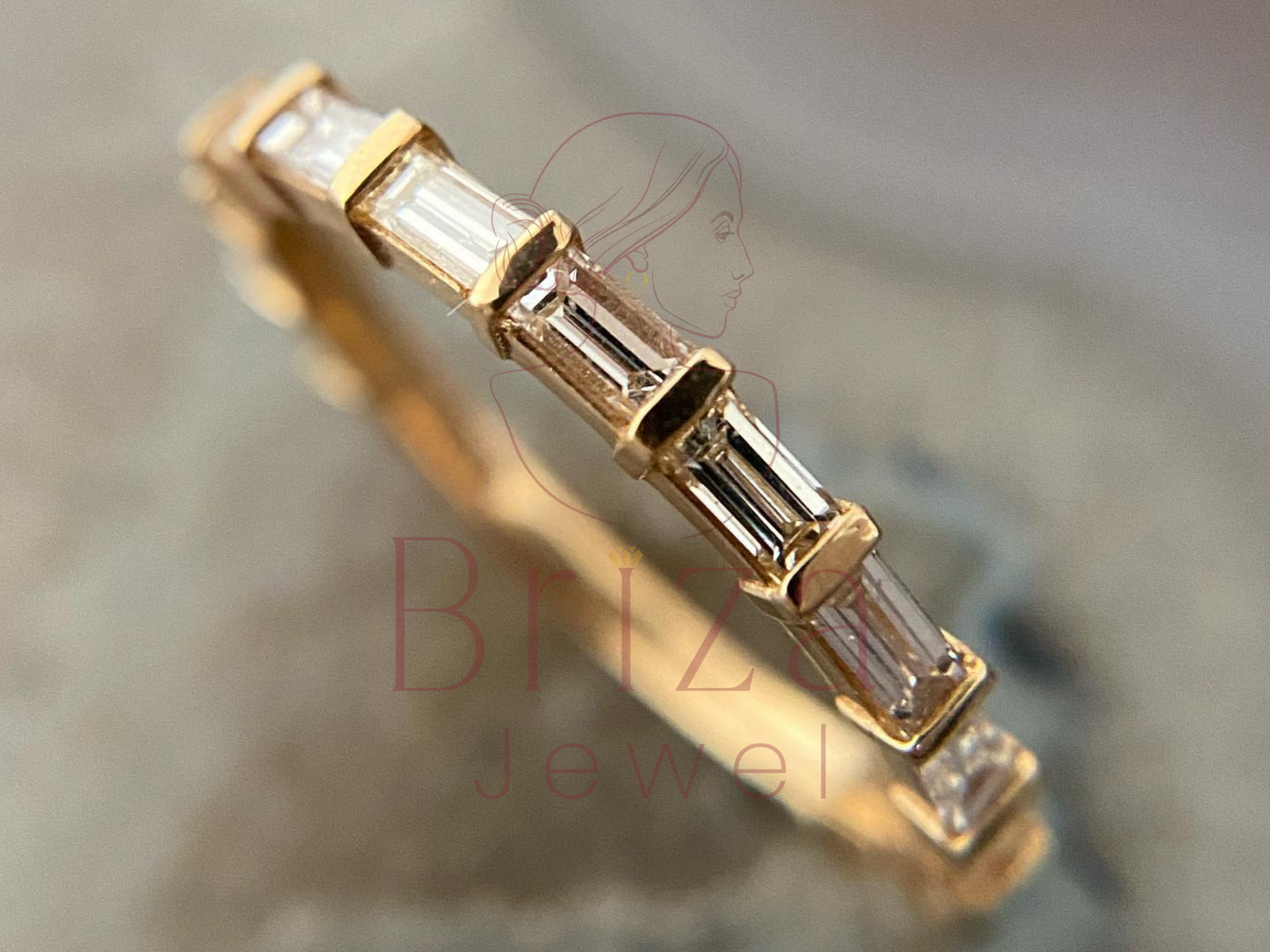 slim gold stacking ring with rectangular diamonds