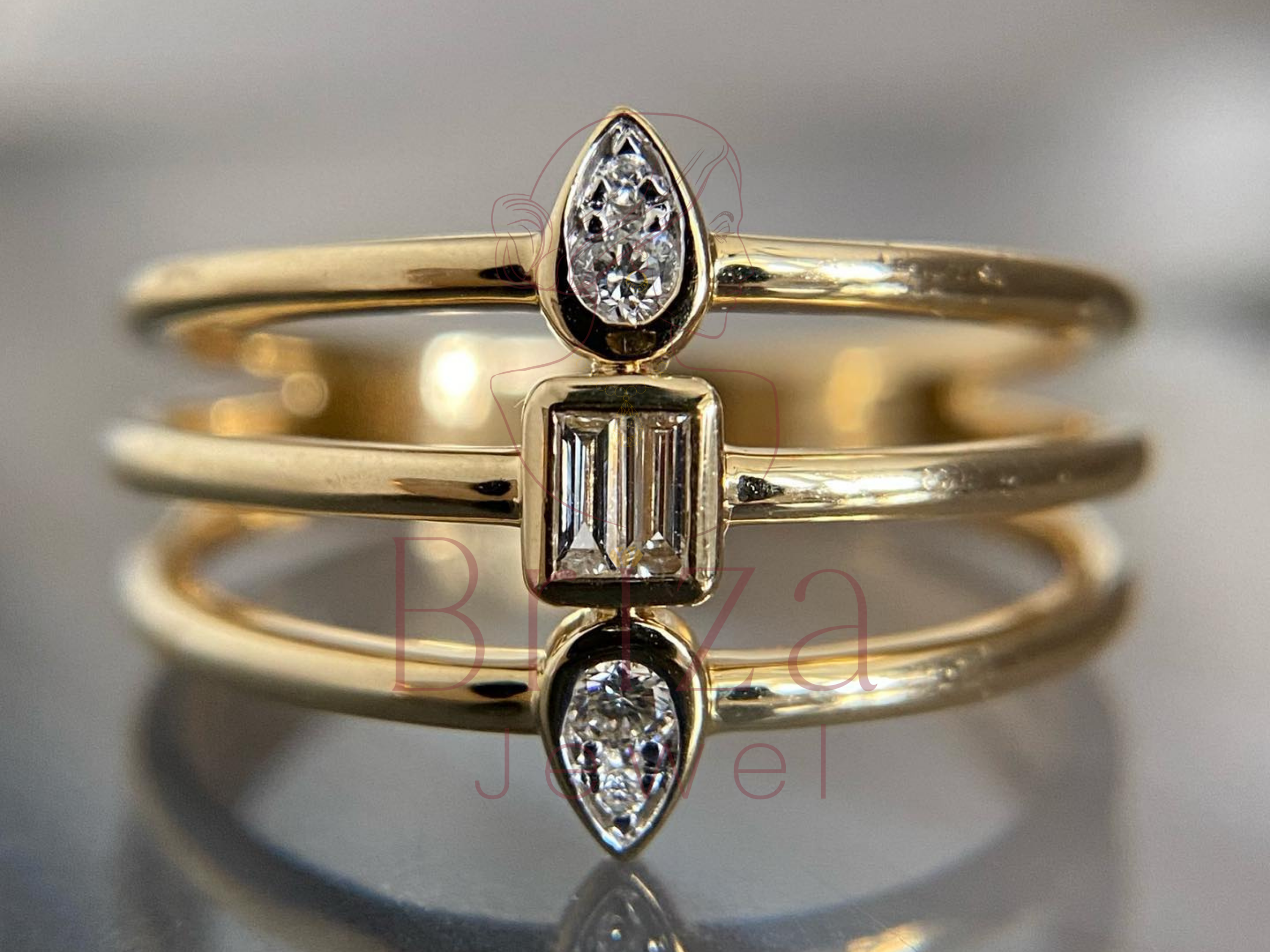 geometric wedding band with pear and baguette lab diamond design