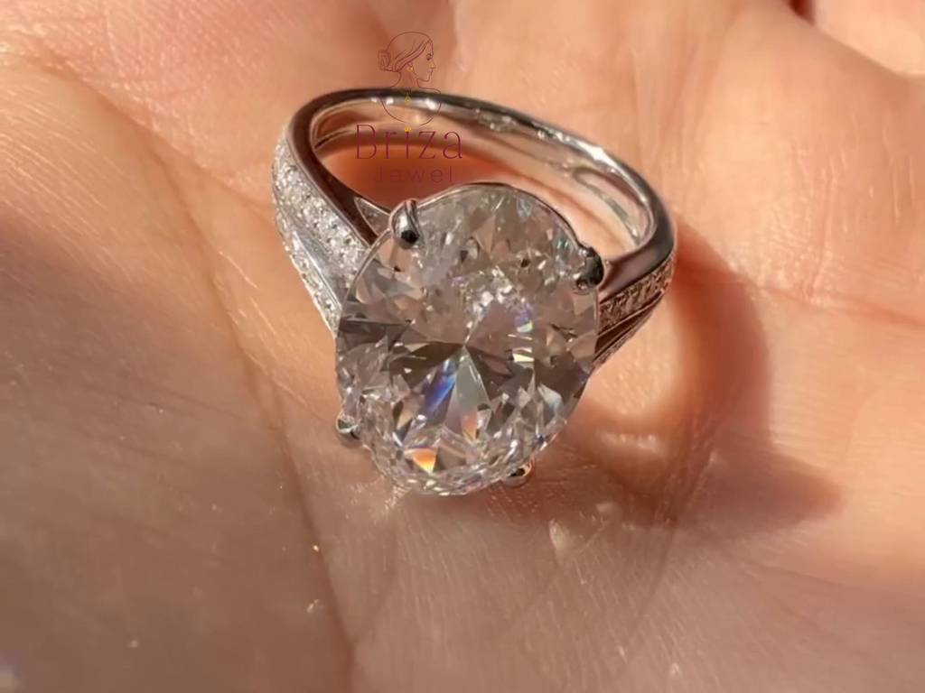 Silver ring with a large diamond on a hand
