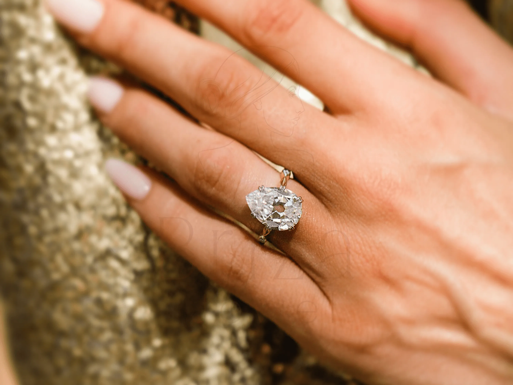 Pear Shaped Diamond Wedding Ring with Yellow Gold Solitaire