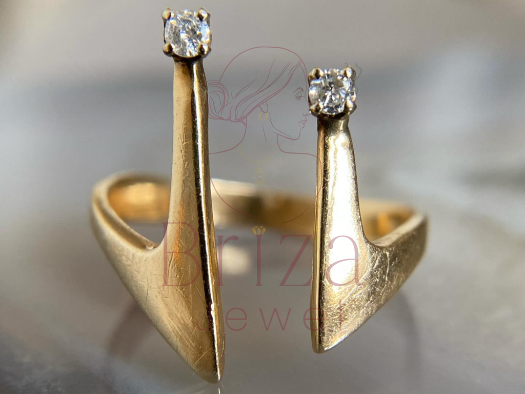 crown ring close-up showing adjustable gold setting