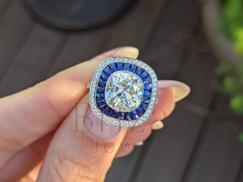 Cushion Cut Halo Engagement Ring with Blue Sapphire Accents