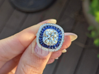 Cushion Cut Halo Engagement Ring with Blue Sapphire Accents