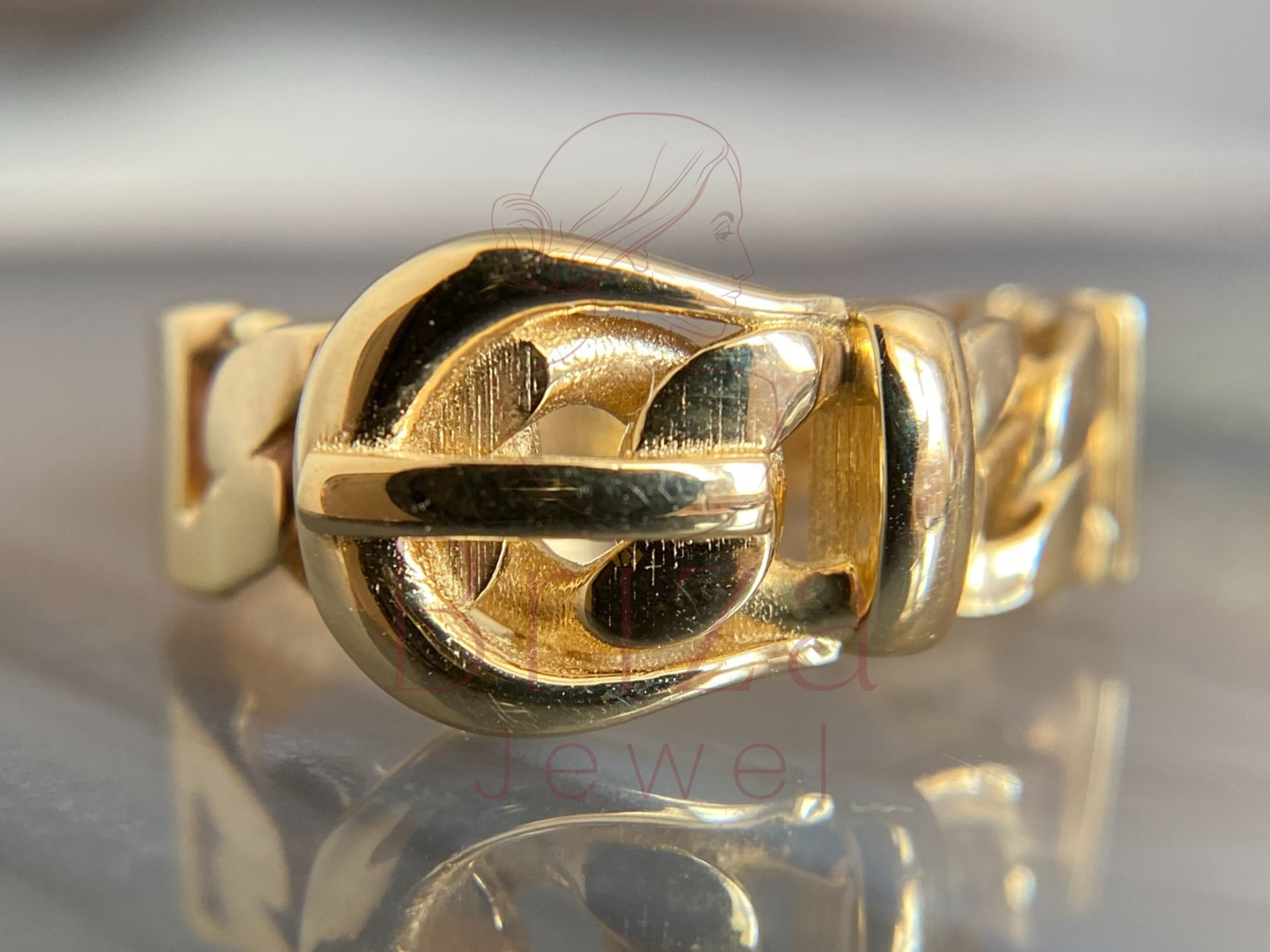 cuban link wedding band with chunky gold buckle style design