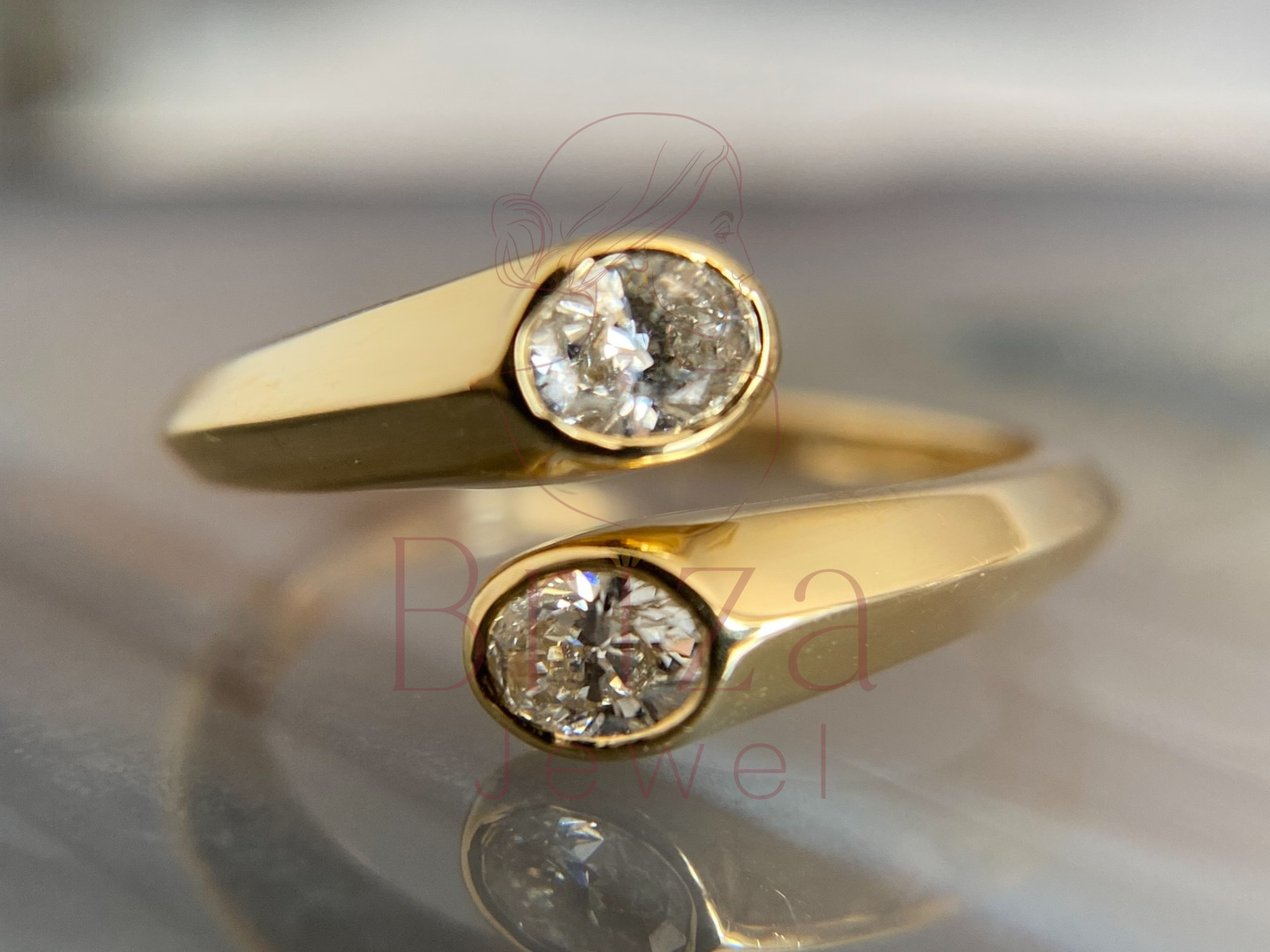 modern bezel engagement ring with open gold band