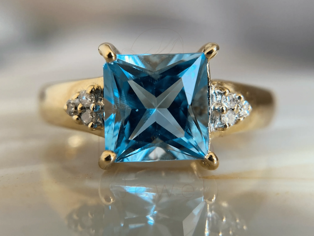 Princess Cut Blue Diamond Ring with Elegant Gold Design
