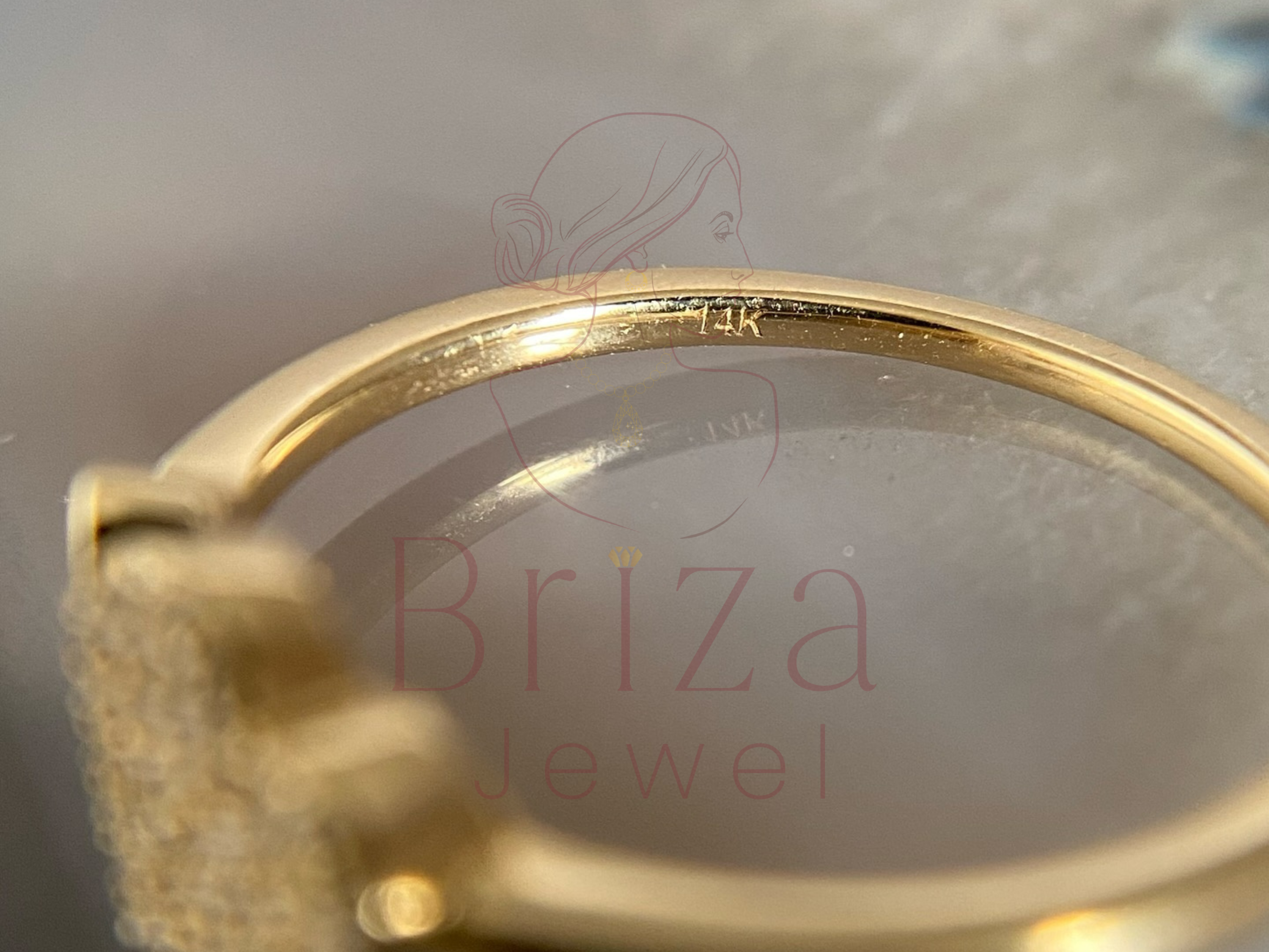 side view of slim adjustable band with raised stone setting