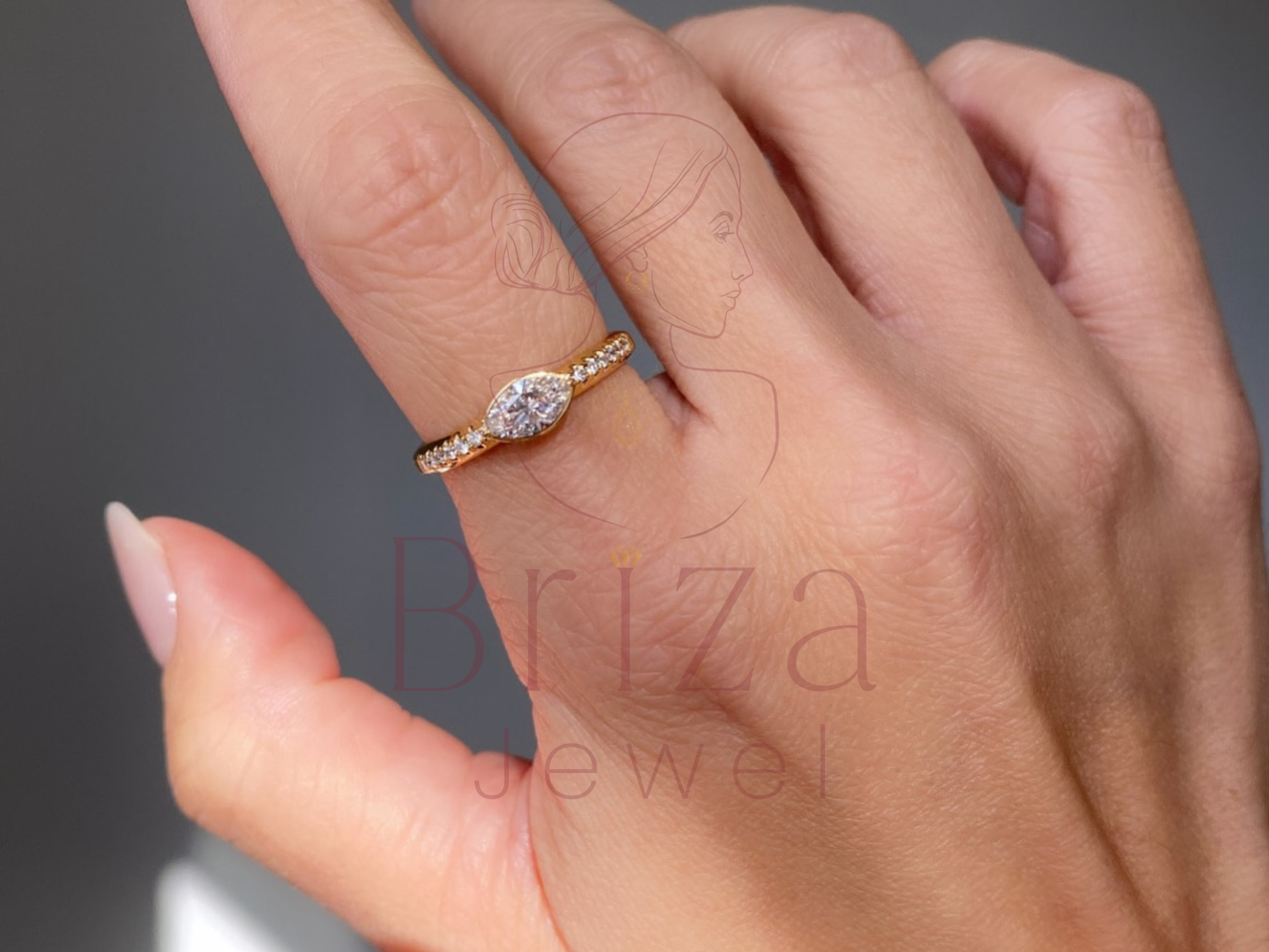 Marquise Cut Diamond Ring with Yellow Gold Pave Band