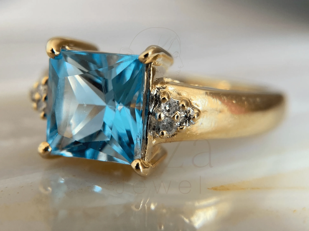 Princess Cut Blue Diamond Ring with Elegant Gold Design