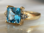 Princess Cut Blue Diamond Ring with Elegant Gold Design