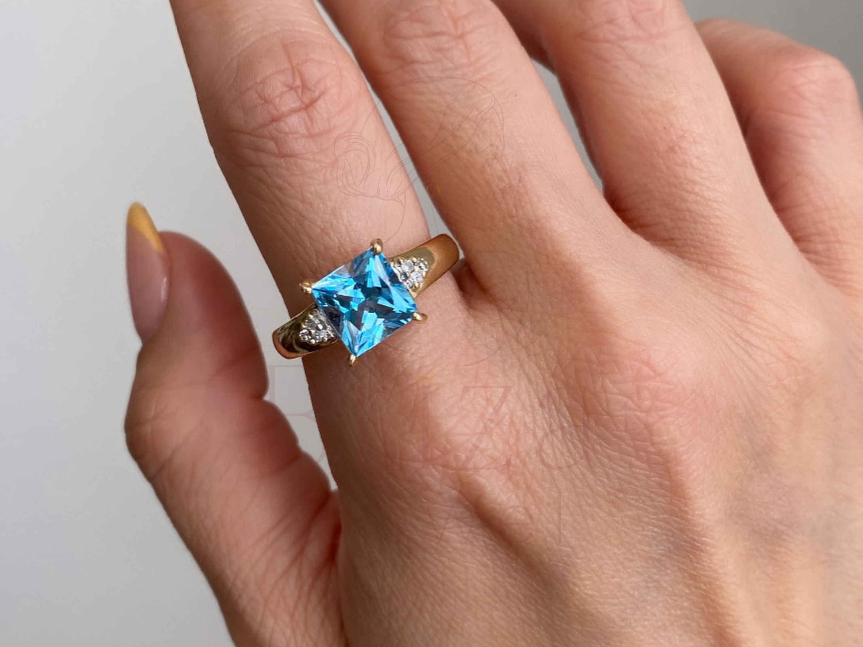 Princess Cut Blue Diamond Ring with Elegant Gold Design