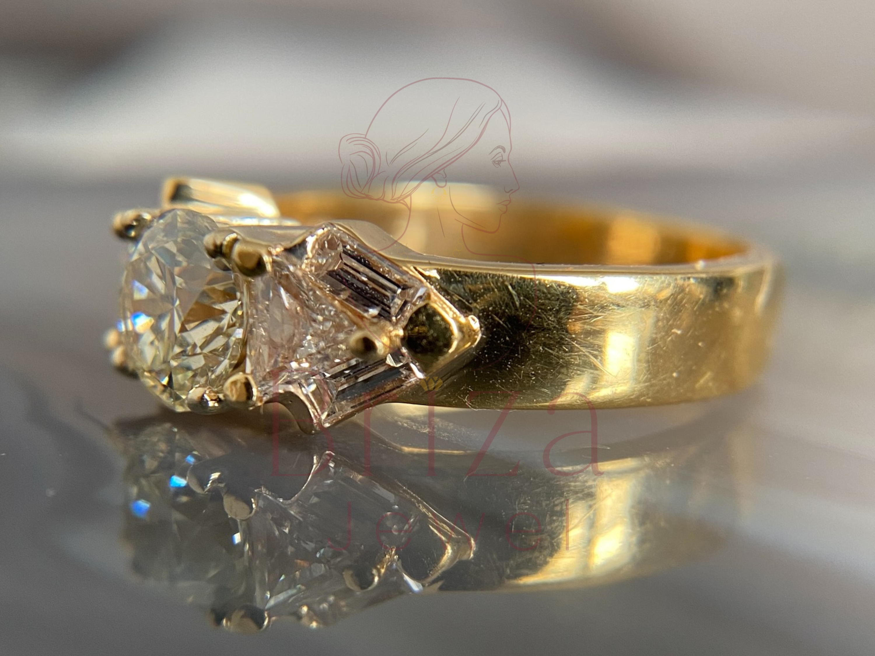 elegant gold engagement jewelry worn on hand lifestyle view