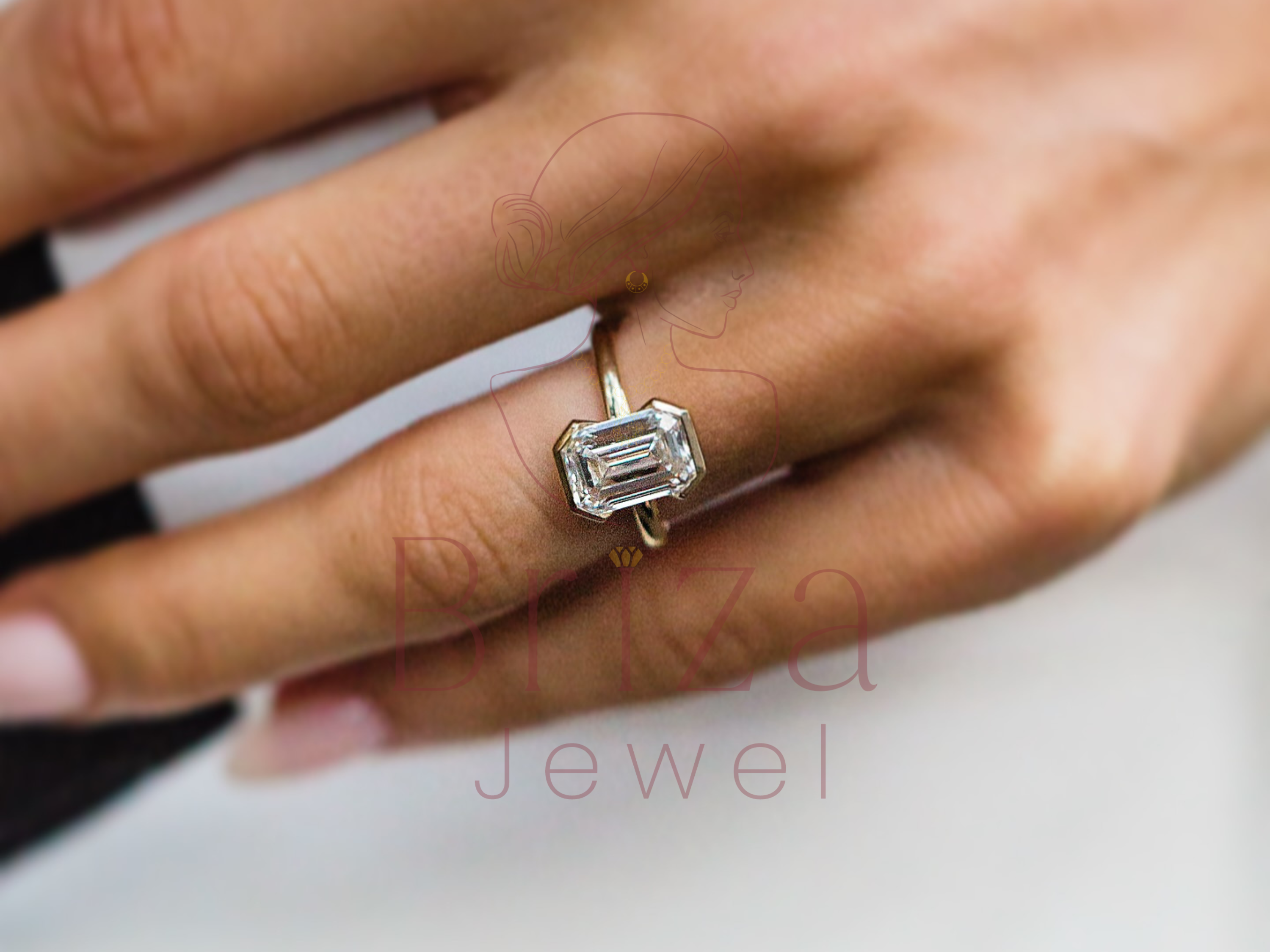 emerald cut engagement diamond ring close-up showing solitaire detail