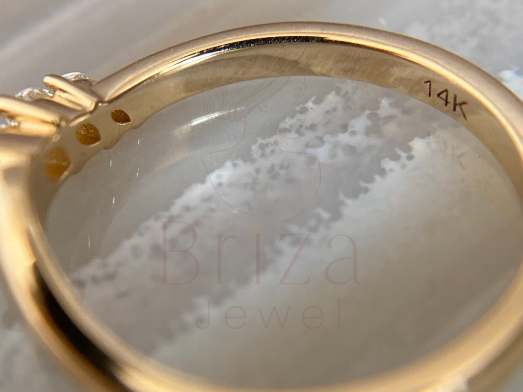 elegant gold jewelry worn on hand lifestyle view