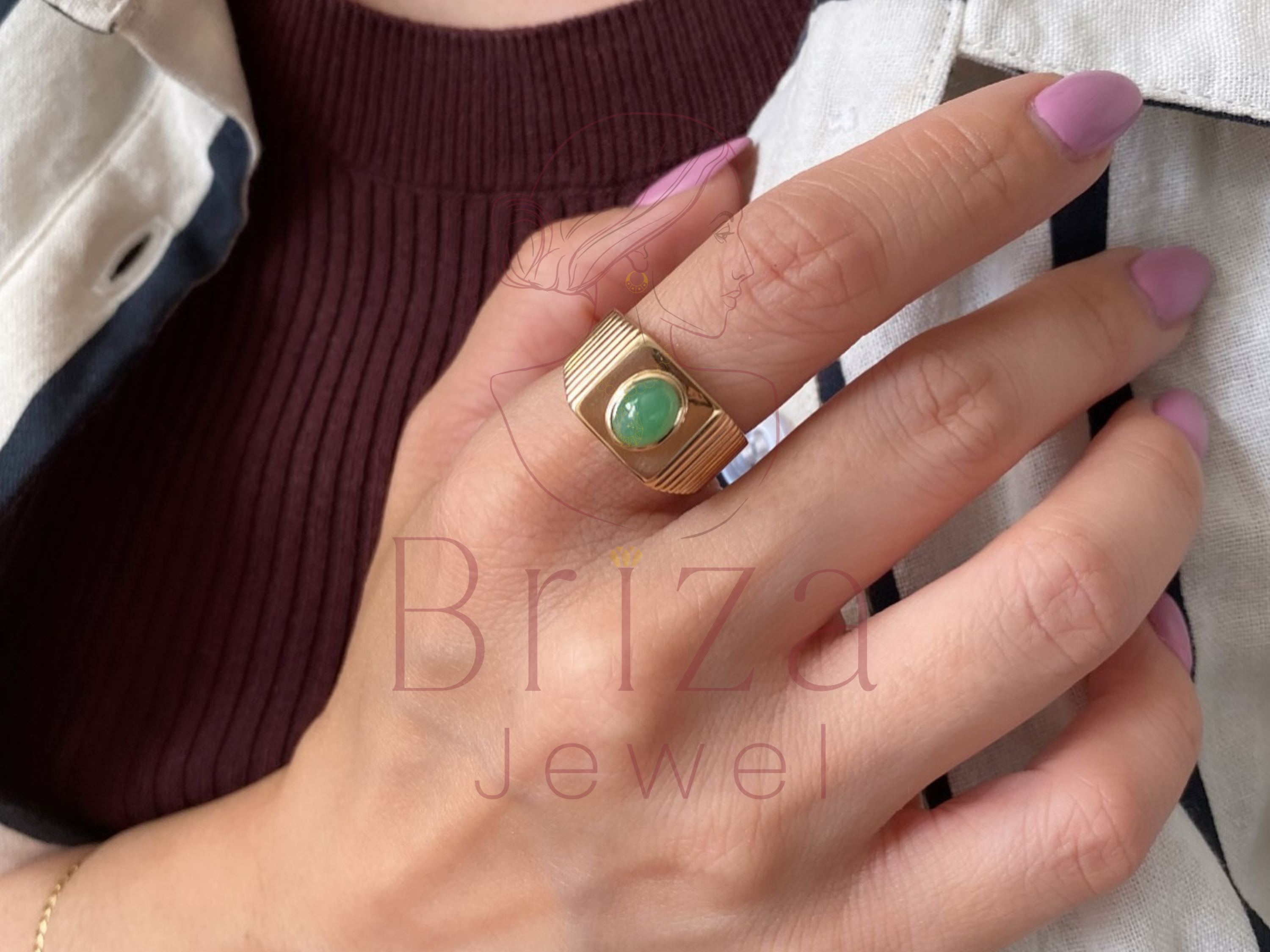 green jade ring close-up showing polished stone detail