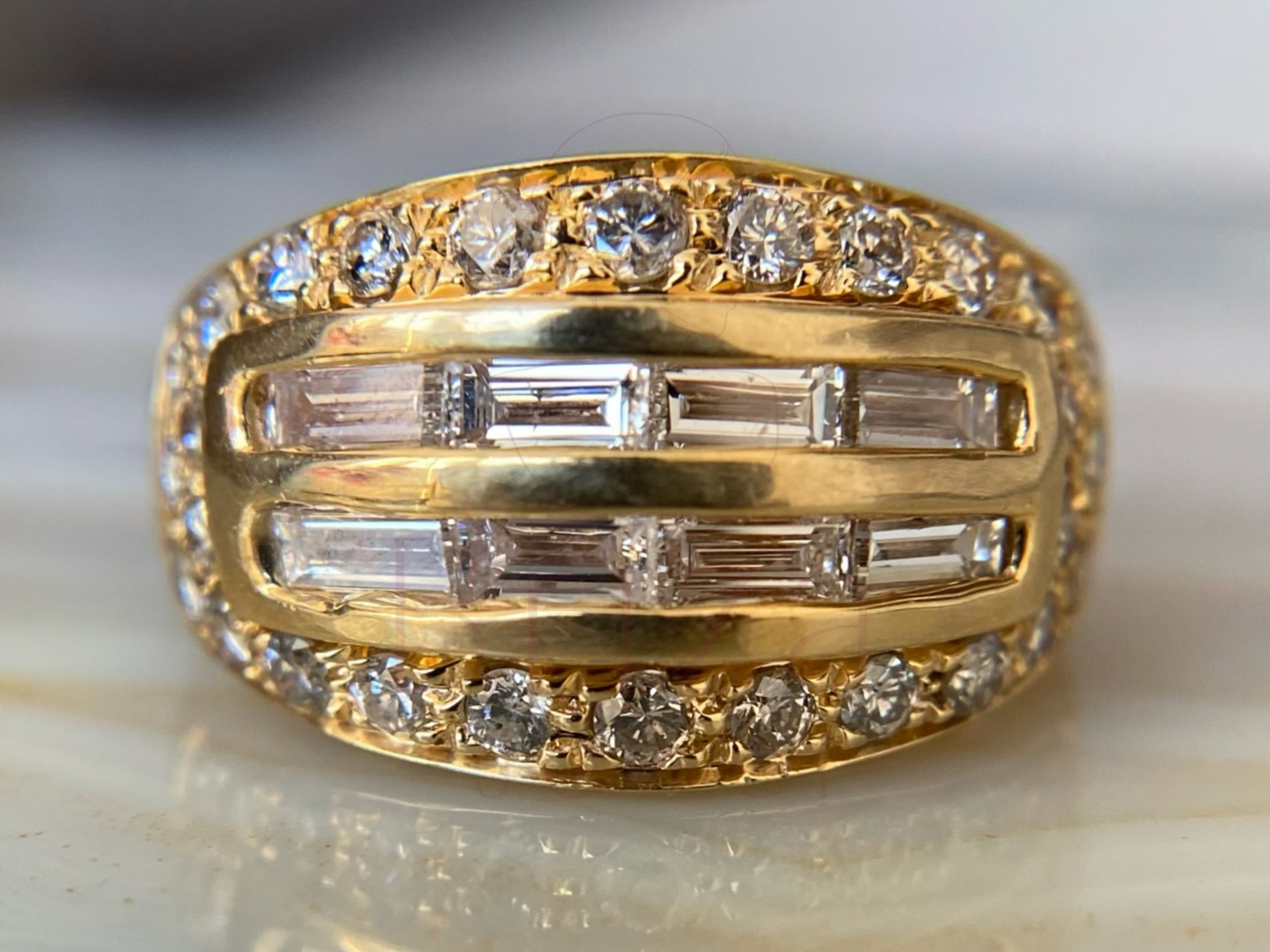 yellow gold baguette diamond ring with 18K vintage statement design