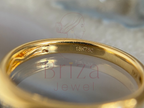 side view of slim gold band with micro-set stones
