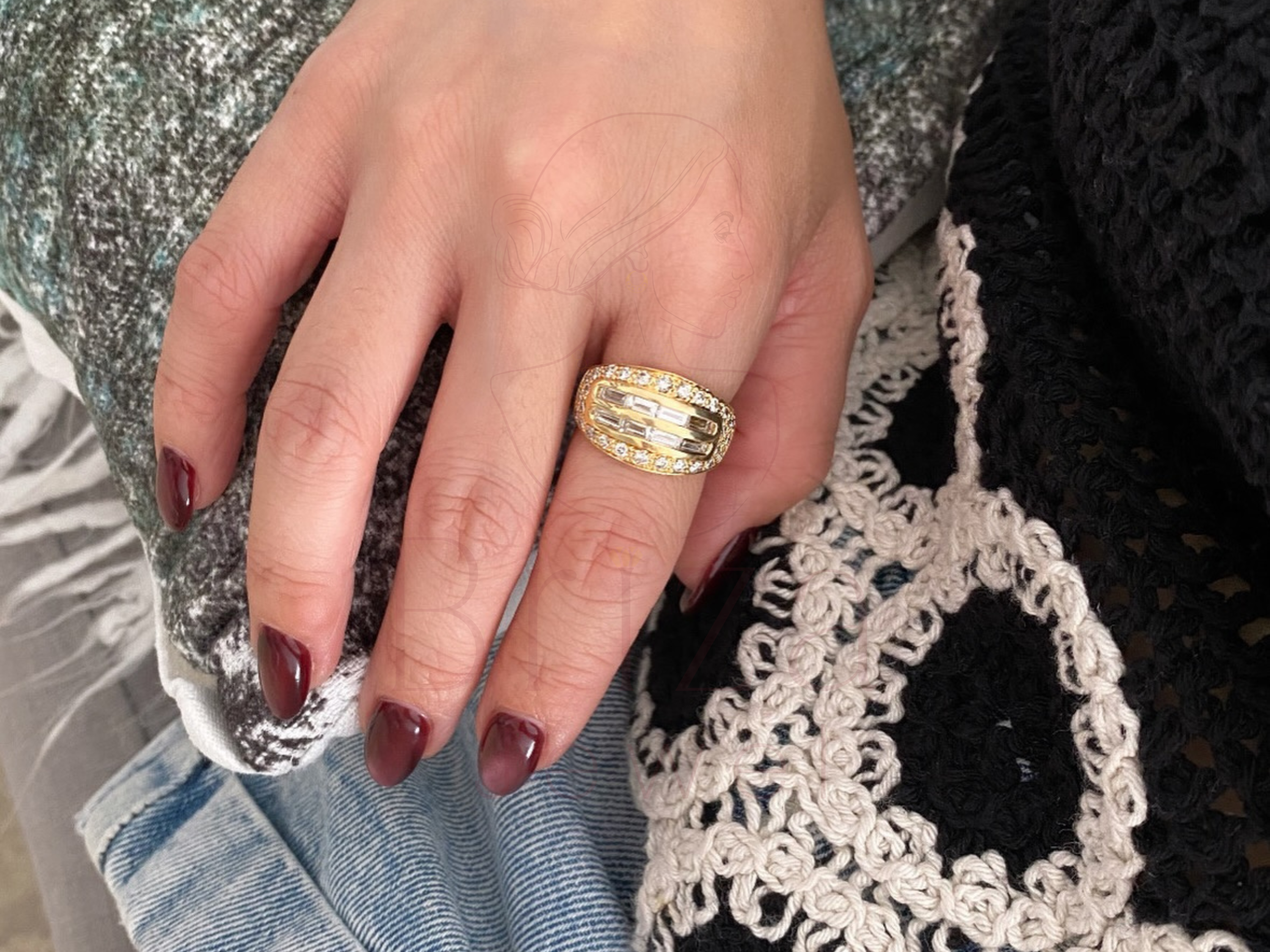 yellow gold baguette diamond ring close-up showing linear stone detail