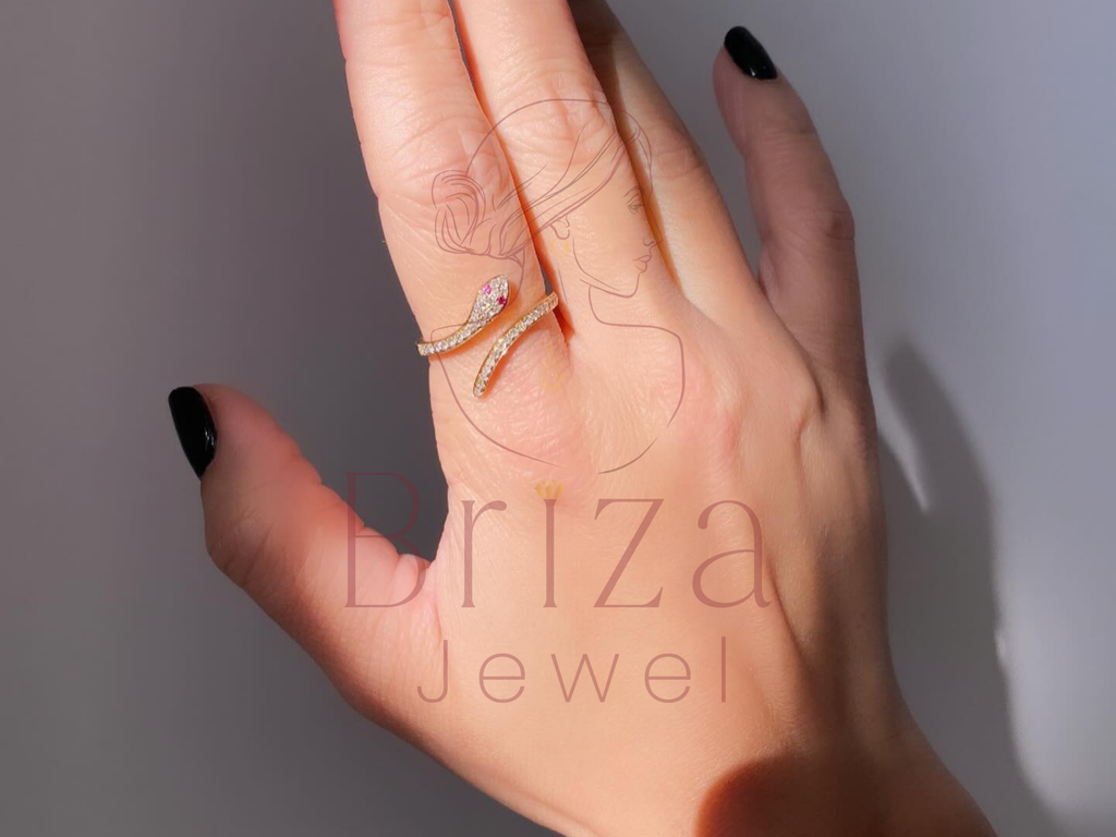 gold serpent ring with sculpted snake design