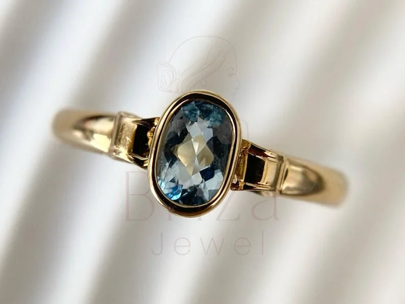 Oval Aquamarine Ring - Yellow Gold Bezel | Briza Jewel