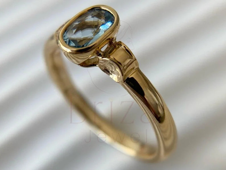 Oval Aquamarine Ring - Yellow Gold Bezel | Briza Jewel